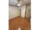 Spacious bedroom with hardwood floors, ceiling fan and two closets at 400 Archibald Rd, Concord, NC 28025