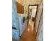 Convenient laundry room with a washer and dryer set plus functional cabinetry and space-saving design at 400 Archibald Rd, Concord, NC 28025