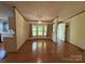 Bright living room featuring hardwood floors and natural light from the bay window at 400 Archibald Rd, Concord, NC 28025