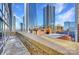 City view from balcony showcasing high-rise buildings against a clear blue sky at 435 S Tryon St, Charlotte, NC 28202
