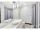 Modern bathroom featuring an unique sink bowl, sleek fixtures, and a luxurious shower at 435 S Tryon St, Charlotte, NC 28202