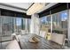 Elegant dining room with a chandelier and city views at 435 S Tryon St, Charlotte, NC 28202