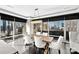 Stunning dining room with city views, a statement chandelier, and ample seating at 435 S Tryon St, Charlotte, NC 28202