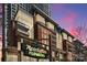 Charming condominium building featuring an art deco style flower shop, located in a bustling neighborhood at 435 S Tryon St, Charlotte, NC 28202