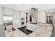 Stylish open kitchen with granite counters, bar and stainless appliances, perfect for entertaining at 435 S Tryon St, Charlotte, NC 28202