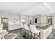 A stylish and expansive kitchen with bar seating and sleek stainless steel appliances at 435 S Tryon St, Charlotte, NC 28202