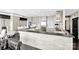A modern kitchen design with bar, offering a great gathering space and style at 435 S Tryon St, Charlotte, NC 28202
