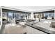 Open-concept living area featuring city views and a black sofa with granite countertop at 435 S Tryon St, Charlotte, NC 28202