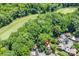 Aerial view of the community with mature trees, landscaping, and single-Gathering homes at 4725 Rounding Run Rd, Charlotte, NC 28277