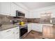 Beautiful kitchen featuring stainless steel appliances, granite countertops, and a decorative backsplash at 4725 Rounding Run Rd, Charlotte, NC 28277