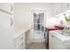 Functional laundry room with washer, dryer, storage cabinets, and countertops for folding laundry at 4725 Rounding Run Rd, Charlotte, NC 28277