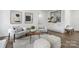 Inviting living room with stylish decor, hardwood floors, and comfortable seating, creating an elegant gathering space at 5817 Red Carriage Ln, Charlotte, NC 28212
