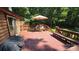 This outdoor space features a spacious deck, perfect for entertaining and enjoying the scenic backyard views at 5832 Thompson Rd, Charlotte, NC 28216