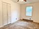 Bright bedroom with closet and window letting in natural light at 613 Catawba St, Chester, SC 29706