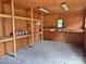 Interior view of storage shed with shelving and small window at 613 Catawba St, Chester, SC 29706