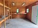 Interior view of storage shed with shelves and a window at 613 Catawba St, Chester, SC 29706