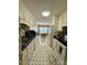 Kitchen featuring white appliances and cabinets with an eat in dining area at 613 Stacy Ridge Rd, Gastonia, NC 28052