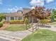 Community clubhouse with manicured lawns, stone accents, and inviting entrance at 739 Elders Story Rd, Fort Mill, SC 29708