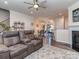 Open living room showcasing modern furnishings, a fireplace and view to dining area at 739 Elders Story Rd, Fort Mill, SC 29708