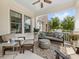 Inviting front porch with comfortable seating and view of neighborhood street at 7732 Waverly Walk Ave, Charlotte, NC 28277