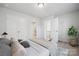 Calm bedroom features plush bedding, neutral colors, and ample closet space for comfortable living at 905 Exeter Dr, Sherrills Ford, NC 28673
