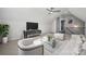 Bonus room featuring a large television, vaulted ceilings, comfortable seating, and recessed lighting at 905 Exeter Dr, Sherrills Ford, NC 28673