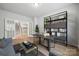 Cozy home office featuring a modern desk, contemporary shelving and a comfortable sitting area at 905 Exeter Dr, Sherrills Ford, NC 28673