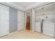 Convenient laundry room featuring appliances and access to living area at 9701 Kent Village Dr, Charlotte, NC 28269