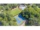 Aerial view of tennis courts surrounded by lush greenery at 9701 Kent Village Dr, Charlotte, NC 28269