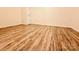 Bright, spacious bedroom with wood-look flooring and neutral walls; ready for personalization at 10105 Reindeer Way Ln, Charlotte, NC 28216