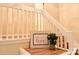 Well-decorated staircase with an inspirational sign and modern potted plant at 10105 Reindeer Way Ln, Charlotte, NC 28216