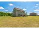 Expansive backyard view, showcasing the lush lawn and outdoor living spaces at 1012 Leland Dr, Wesley Chapel, NC 28104