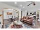Open-concept living room showcases hardwood floors and seamless flow into the dining and kitchen areas at 1012 Leland Dr, Wesley Chapel, NC 28104