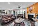 Spacious living room features a fireplace, hardwood floors, and ample seating at 1012 Leland Dr, Wesley Chapel, NC 28104