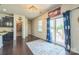 Living room with sliding glass doors leading to an outdoor patio and a walk in pantry nearby at 1012 Leland Dr, Wesley Chapel, NC 28104