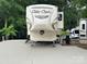 Cedar Creek Silverback Edition RV showing hitch, support system, and front profile at 104 Cardinal Dr, New London, NC 28127