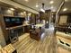 Great shot of the living space featuring TV, fireplace, kitchen and dining area at 104 Cardinal Dr, New London, NC 28127