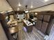View of RV Living Space with full kitchen, seating area and dining table at 104 Cardinal Dr, New London, NC 28127
