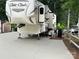 Well-maintained RV with modern features and amenities on a concrete pad at 104 Cardinal Dr, New London, NC 28127