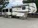 RV with awnings and plenty of storage space, ideal for comfortable and convenient living at 104 Cardinal Dr, New London, NC 28127
