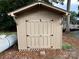 Close up of the small wooden shed at 104 Cardinal Dr, New London, NC 28127