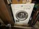 A front-load washing machine is neatly installed at 104 Cardinal Dr, New London, NC 28127
