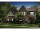 Charming two-story home with a well-maintained lawn and landscaped garden at 11412 Preservation Ln, Charlotte, NC 28278