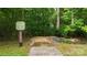 Inviting trail entrance for neighborhood enjoyment near lush greenery and natural surroundings at 11412 Preservation Ln, Charlotte, NC 28278