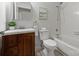 Well-maintained bathroom with a vanity, mirror, toilet, and shower/tub combo, designed for comfort and functionality at 11539 Five Cedars Rd, Charlotte, NC 28226