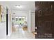 Inviting foyer leading to living spaces with great natural light and modern finishes at 11539 Five Cedars Rd, Charlotte, NC 28226