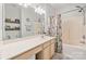 Bright bathroom with a large vanity, tub, and shower at 12342 Carrigan Ct, Huntersville, NC 28078