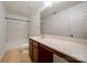 Bathroom with a very long countertop and mirror and separated from tub at 124 Glade Valley Ave, Mooresville, NC 28117