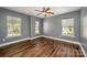 This bedroom has three windows and nice hard wood floors and is very spacious at 124 Glade Valley Ave, Mooresville, NC 28117