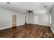 Large bedroom with ceiling fan, hardwood floors, and 2 closets at 124 Glade Valley Ave, Mooresville, NC 28117